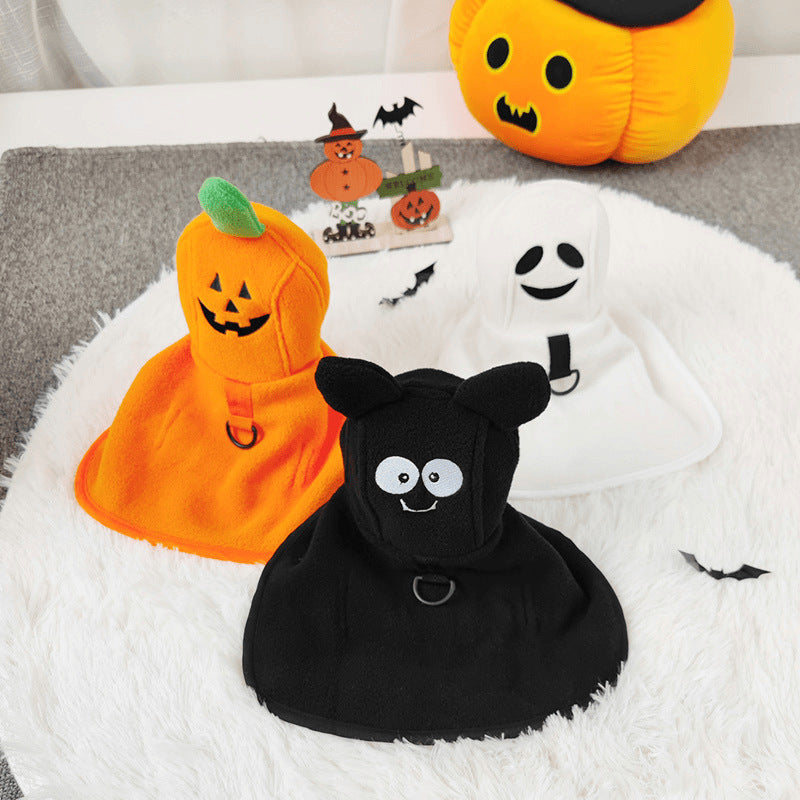 Orange pumpkin, white ghost, and black bat hooded pet capes; sold individually.